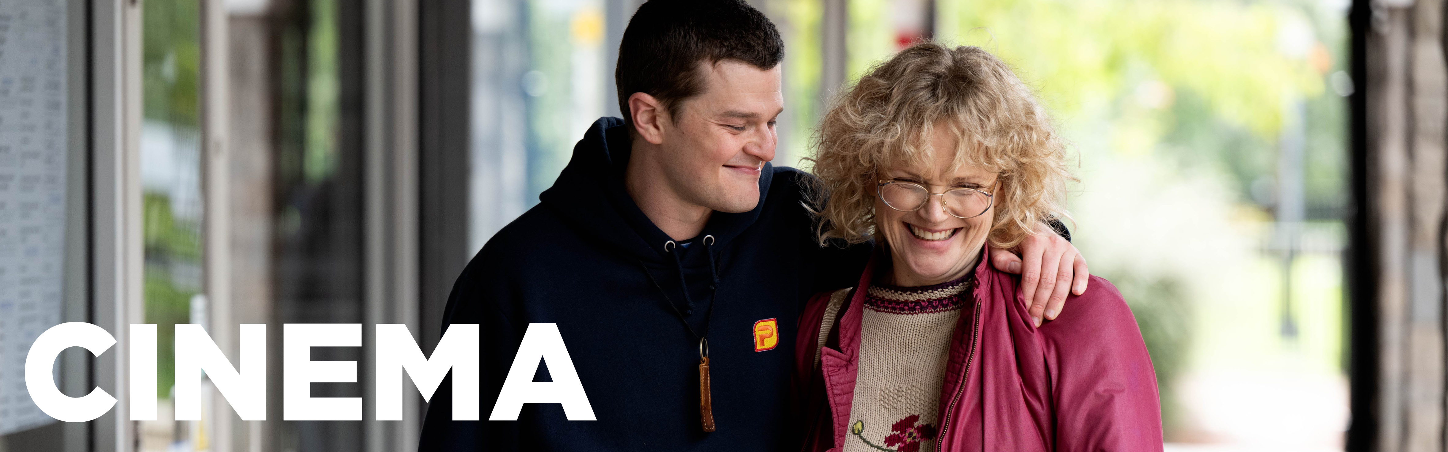 November cinema banner. Man and woman hugging